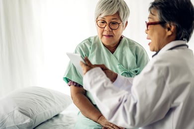 Doctor explaining something to a patient