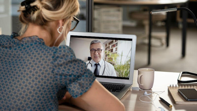 A patient in a decentralized clinical trial checks in with healthcare providers virtually, avoiding some of the patient burden that comes with traditional trials at traditional research sites